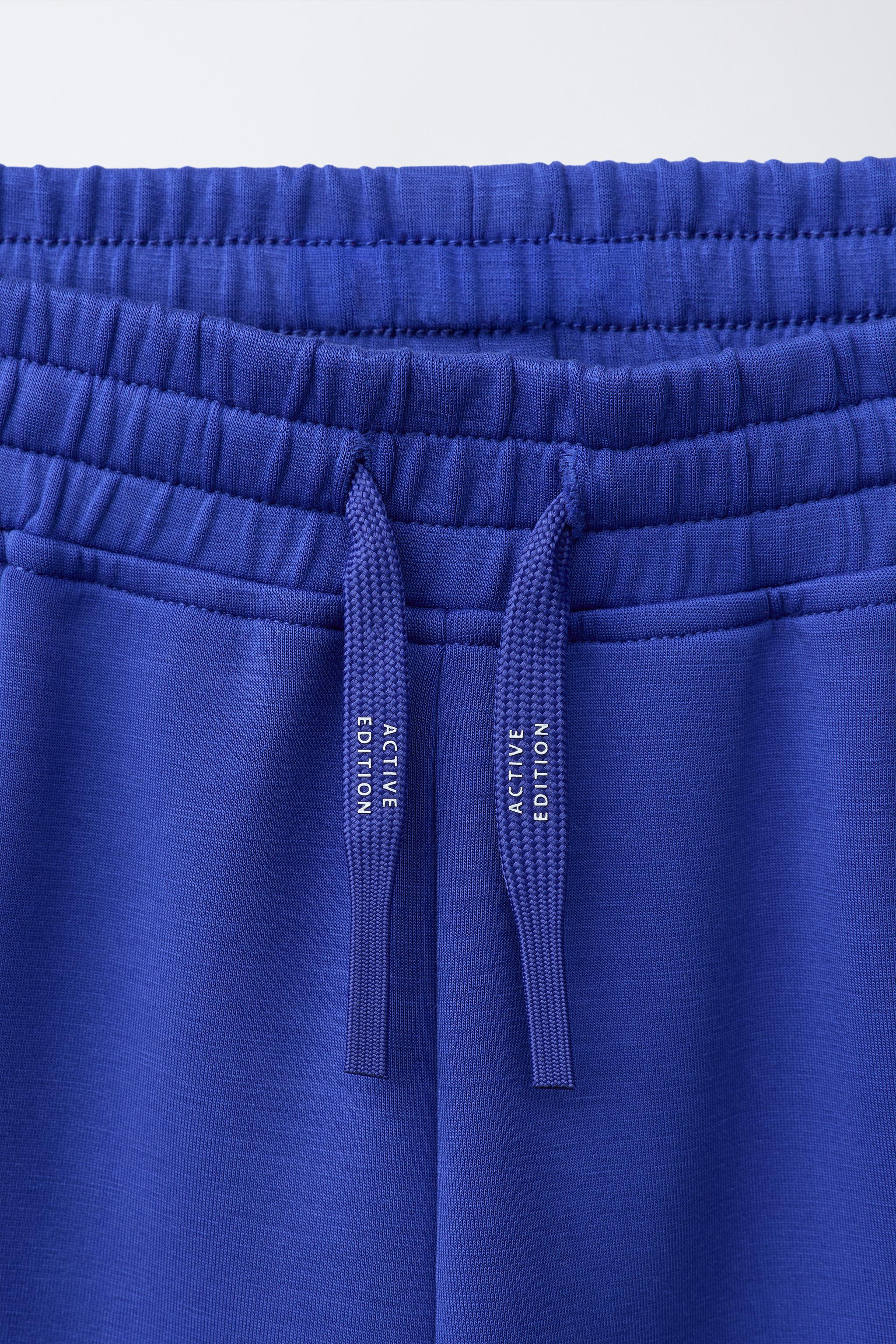 ATHLETIC LOGO SHORTS